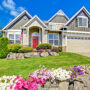 Beautiful suburban home with garden and blue sky