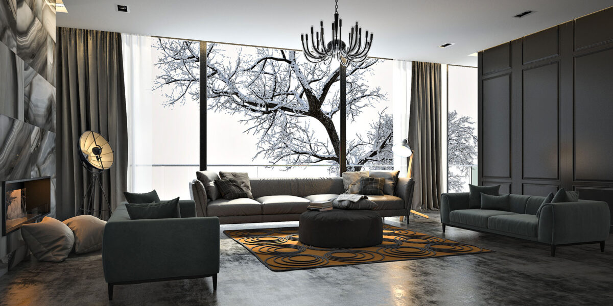 Great room with large windows with snow-covered tree outside.