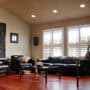 Great room with pot lights, redwood hardwood floors, electronic window coverings.