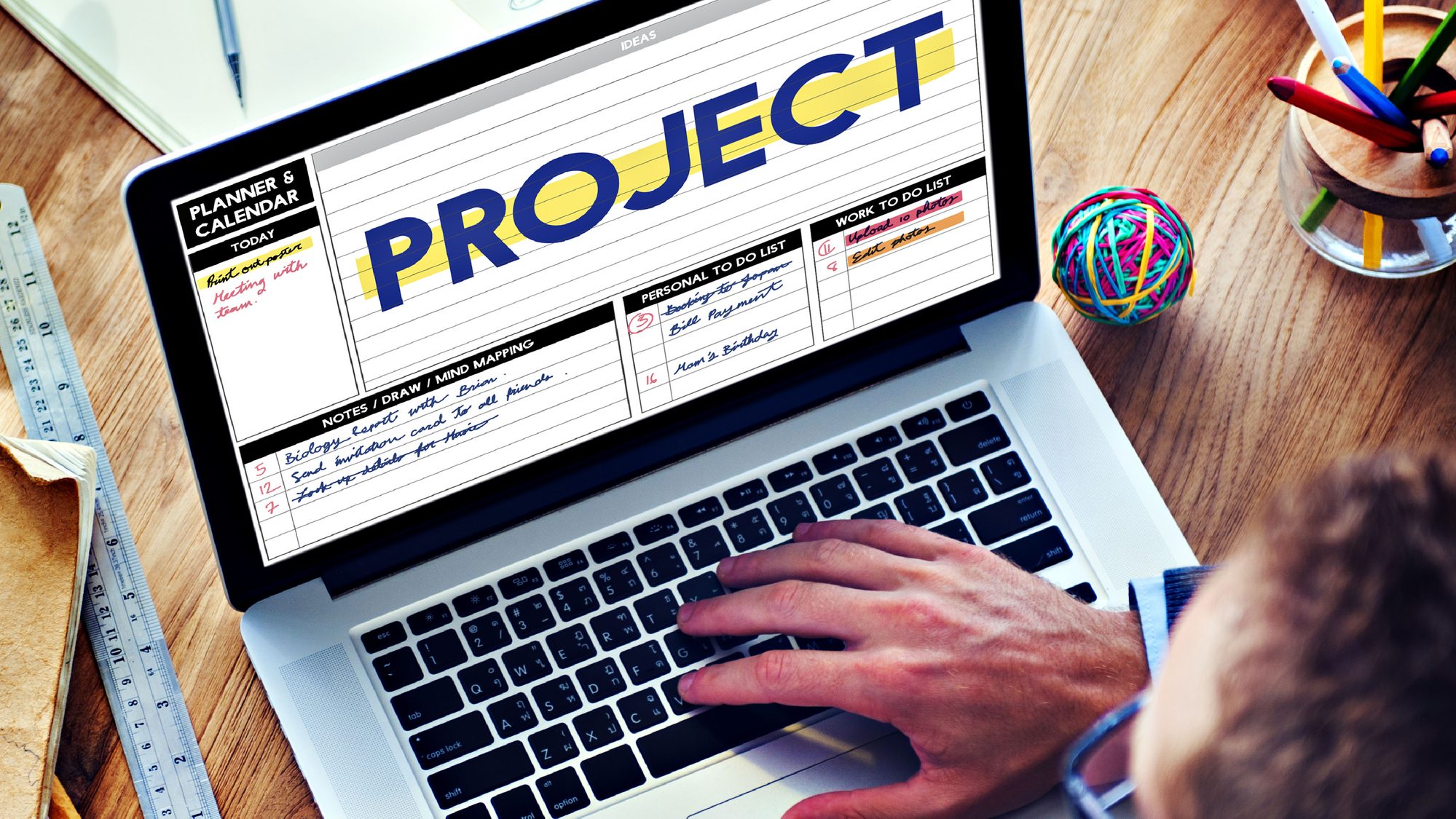 Person managing tasks on a digital project planner and calendar