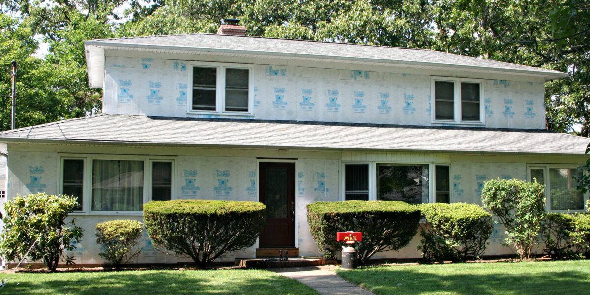 House being prepared for new siding.