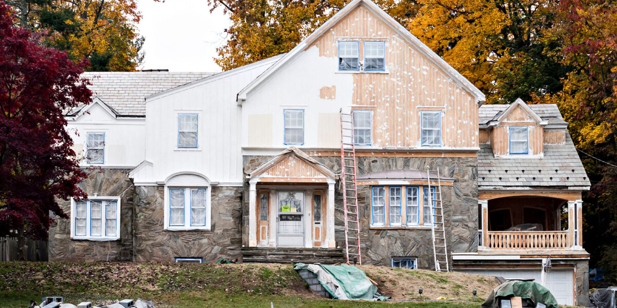 Partially renovated heritage house with autumn foliage
