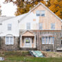Partially renovated heritage house with autumn foliage