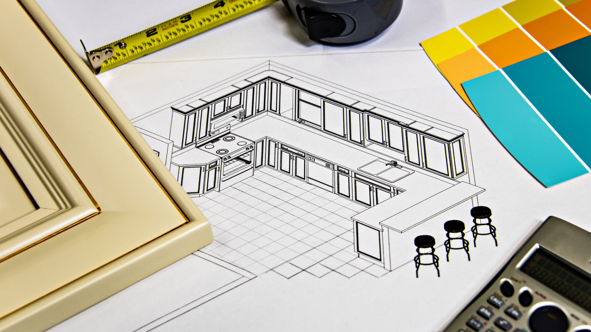 Kitchen renovation blueprint with colour swatches and measuring tools