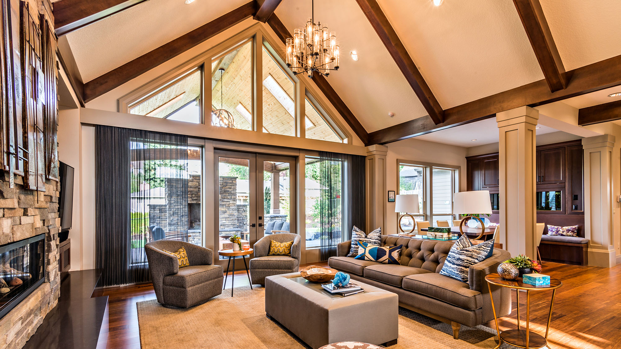 Spacious modern living room with vaulted ceilings and elegant decor