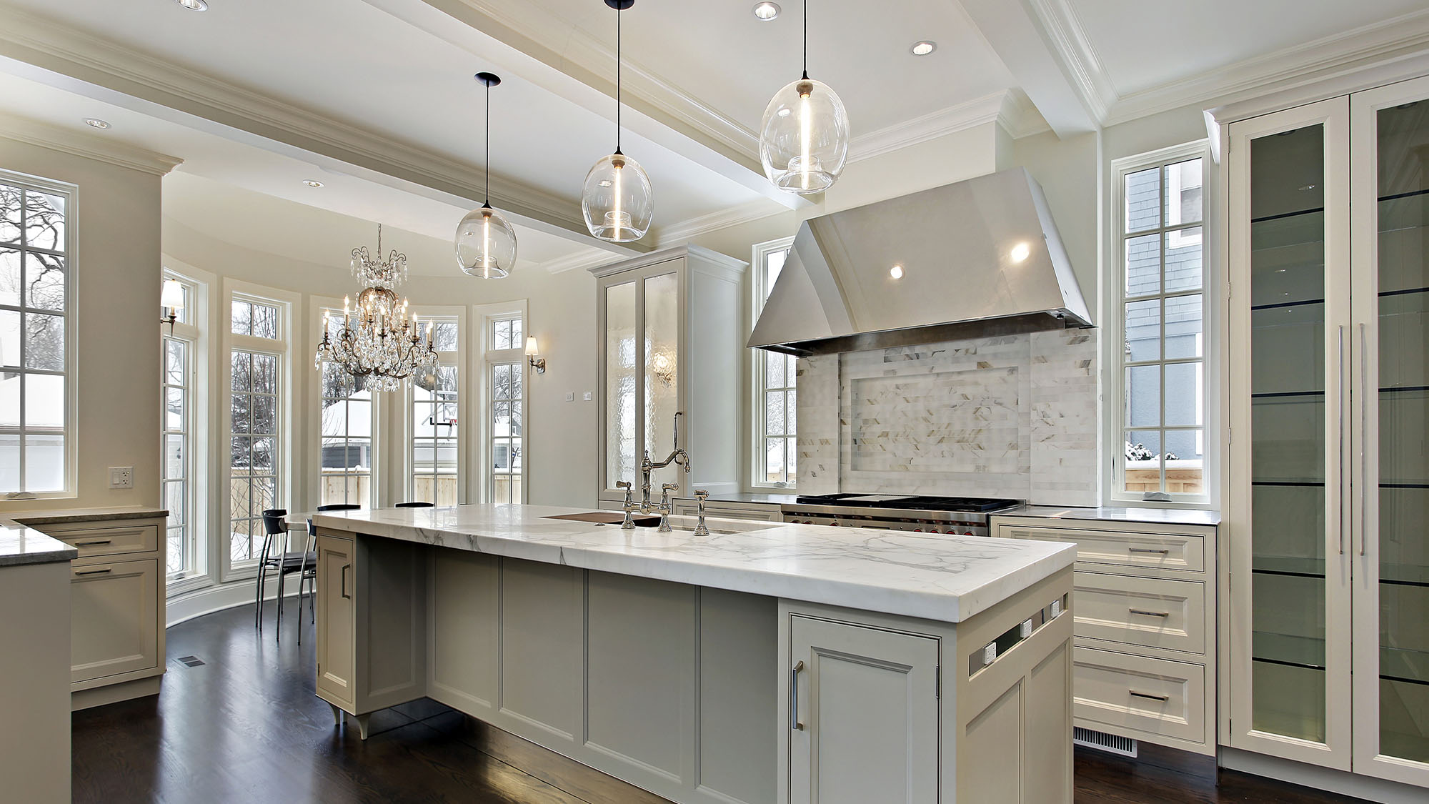 Modern luxury kitchen with marble countertops and stainless steel appliances